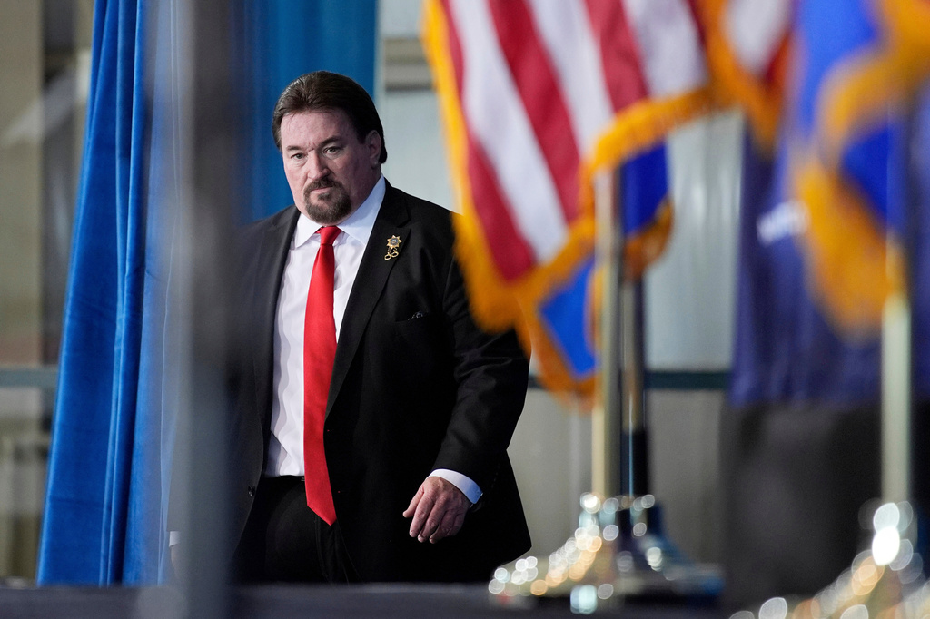 FILE - Nevada GOP chair Michael McDonald walks on stage before speaking ahead of Republican presidential candidate former President Donald Trump at a campaign event, Jan. 27, 2024, in Las Vegas. (AP Photo/John Locher, File)