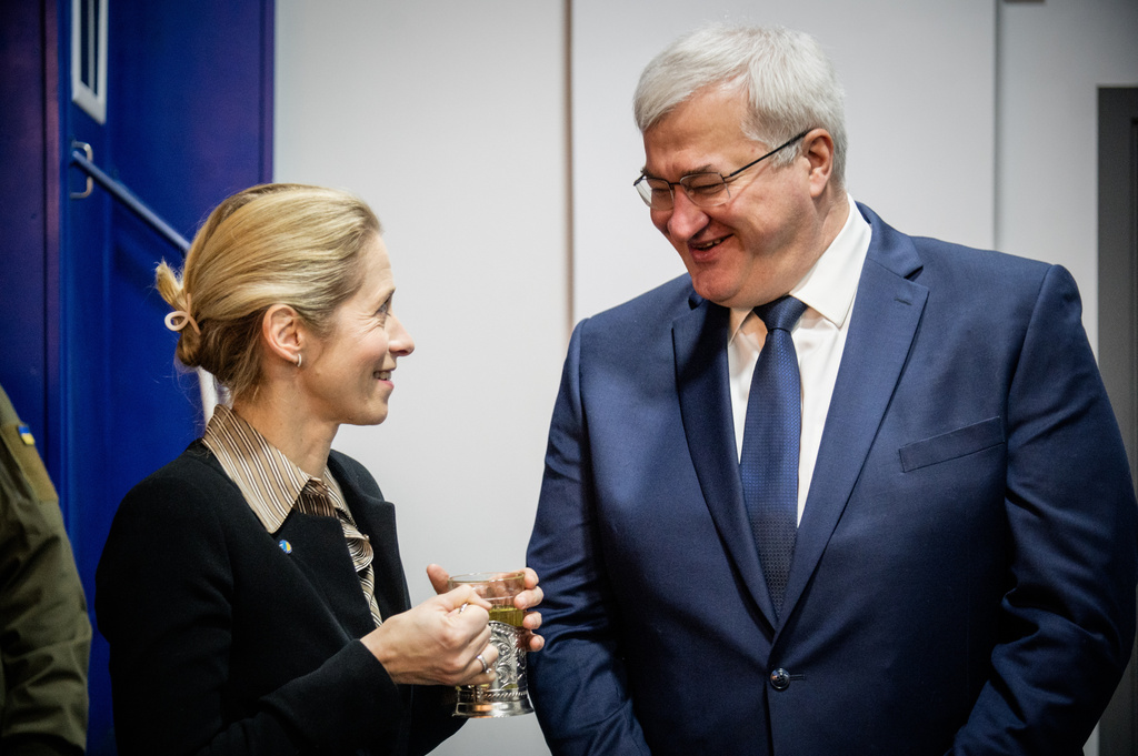 In this photo provided by the Ukrainian Foreign Ministry Press Office, High Representative of the European Union for Foreign Affairs and Security Policy Kaja Kallas, left, and Ukraine's Foreign Minister Andrii Sybiha talk at a railway station in Kyiv, Ukraine, Tuesday, March 31, 2026. (Ukrainian Foreign Ministry Press Office via AP)