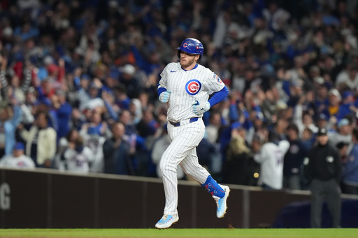 Chicago Cubs' Ian Happ (8) runs the bases after hitting a 3-run home run during the first inning of Game 4 of baseball's National League Division Series against the Milwaukee Brewers Thursday, Oct. 9, 2025, in Chicago. (AP Photo/Nam Y. Huh) Chicago Cubs' Ian Happ (8) runs the bases after hitting a 3-run home run during the first inning of Game 4 of baseball's National League Division Series against the Milwaukee Brewers Thursday, Oct. 9, 2025, in Chicago. (AP Photo/Nam Y. Huh)
