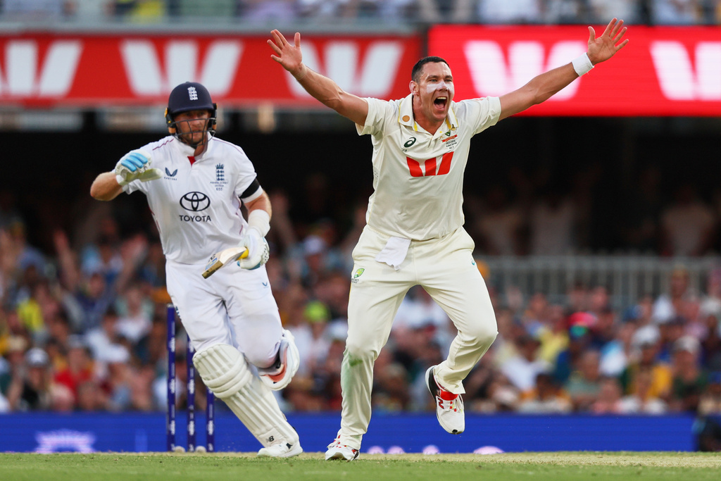 Australia's Scott Boland appeals unsuccessfully for the wicket of England's Harry Brook, unseen, during the second Ashes cricket test match between Australia and England in Brisbane, Thursday, Dec. 4, 2025.. (AP Photo/Tertius Pickard)