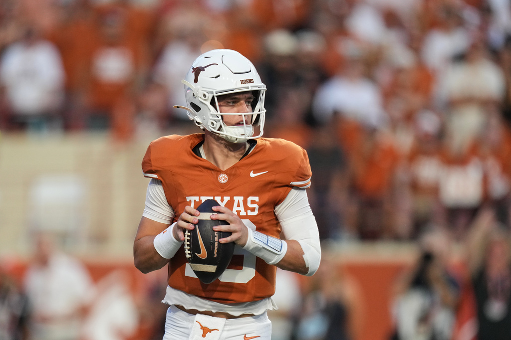 Texas quarterback Arch Manning drops back to pass during the first half of an NCAA college football game against UTSA in Austin, Texas, Saturday, Sept. 19, 2026. (AP Photo/Eric Gay)