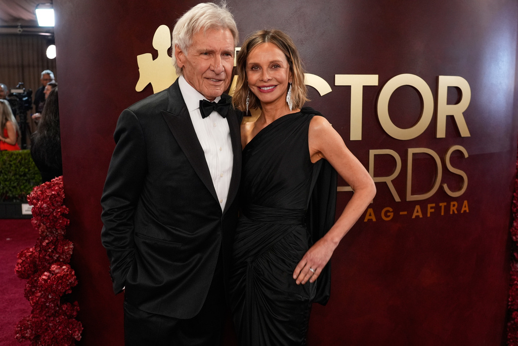 Harrison Ford, left, and Calista Flockhart arrive at the 32nd Annual Actor Awards on Sunday, March 1, 2026, at the Shrine Auditorium and Expo Hall in Los Angeles. (AP Photo/Chris Pizzello)