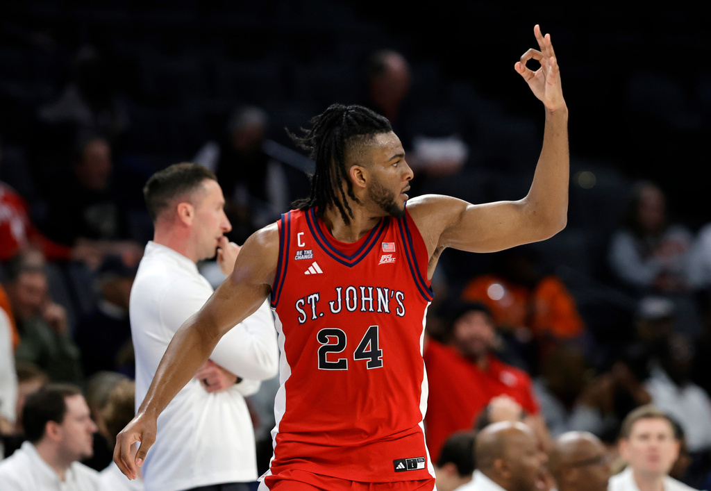 St. John's forward Zuby Ejiofor (24) reacts after making a three-point basket against Auburn during the second half of an NCAA college basketball game in the Players Era tournament Wednesday, Nov. 26, 2025, in Las Vegas. (AP Photo/Steve Marcus)