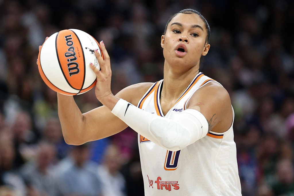 FILE - Phoenix Mercury forward Satou Sabally (0) looks to pass against the Minnesota Lynx during the first half of Game 2 of a WNBA basketball playoff semifinals series Tuesday, Sept. 23, 2025, in Minneapolis. (AP Photo/Matt Krohn, File)