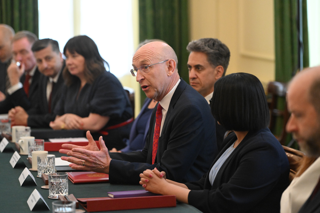 Britain's Chancellor of the Exchequer John Healey, center, attends the first cabinet meeting held by Prime Minister Andy Burnham at 10 Downing Street, London, Tuesday July 21, 2026. (Eddie Mulholland/Pool Photo via AP)