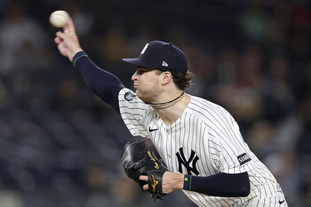 New York Yankees pitcher Cam Schlittler throws during the first inning of a baseball game against the Tampa Bay Rays, Thursday, Sept. 24, 2026, in New York. (AP Photo/Adam Hunger)