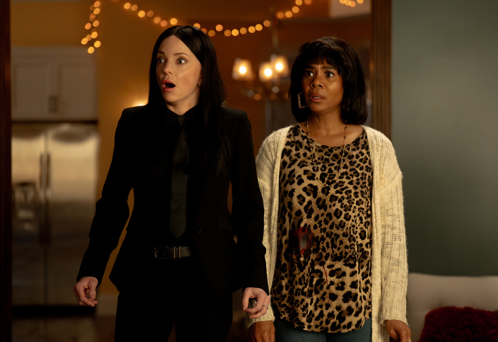This image released by Paramount Pictures shows Anna Faris, left, and Regina Hall in a scene from "Scary Movie." (Quantrell Colbert/Paramount Pictures via AP)