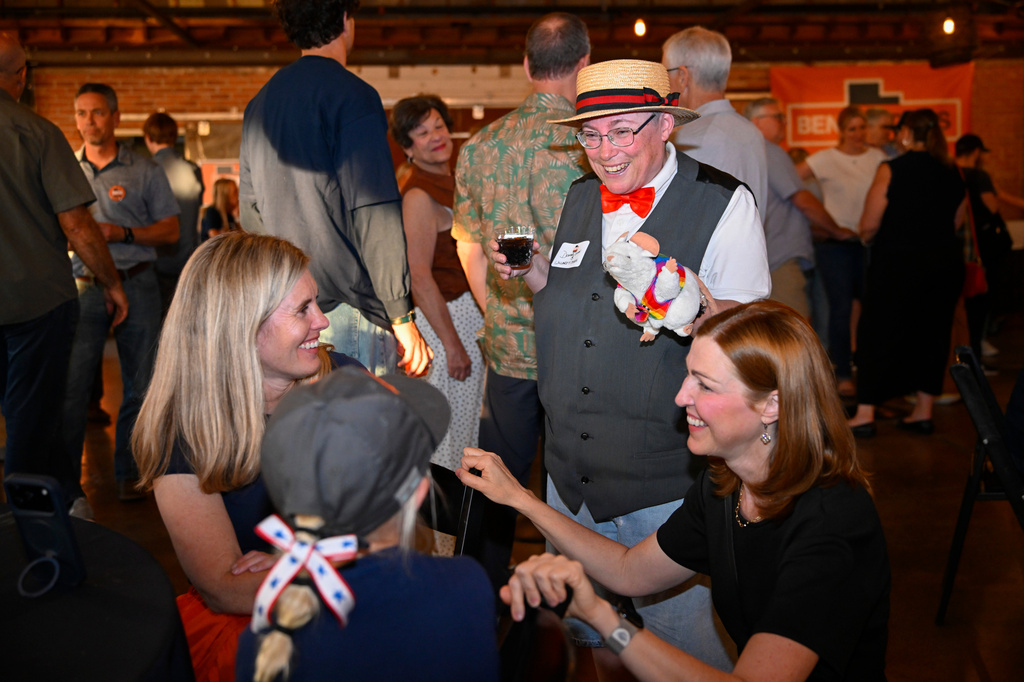 Donna Gunn, center, speaks to supporters for democratic congressional candidate Ben McAdams during a watch party for Utah's primary election on Tuesday, June 23, 2026, in Salt Lake City. (AP Photo/Alex Goodlett)