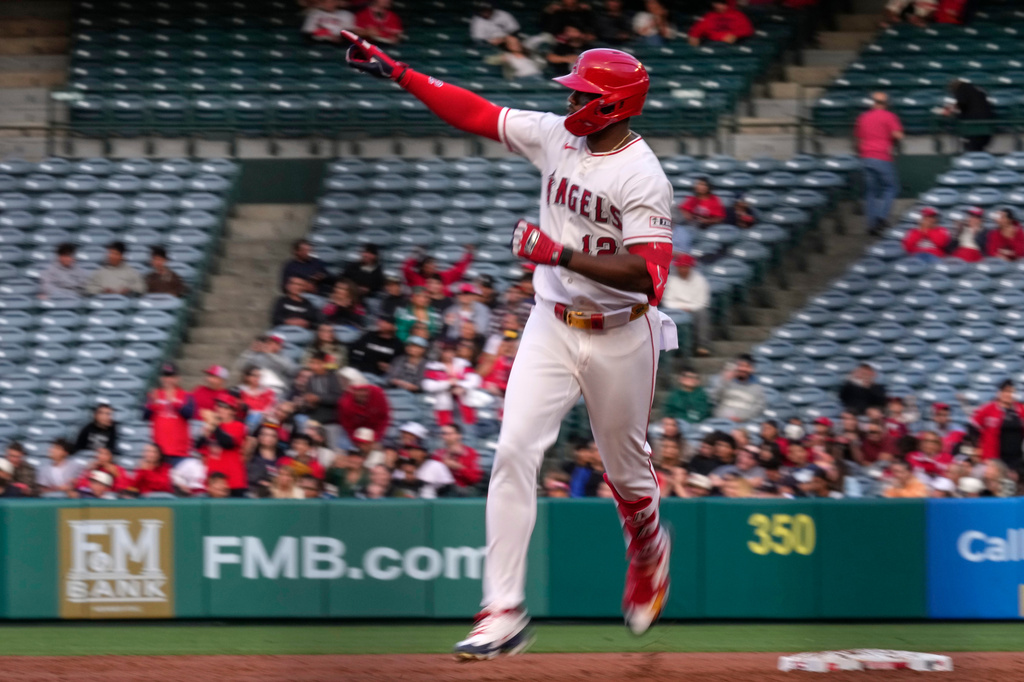Los Angeles Angels' Jorge Soler gestures as he rounds second after hitting a solo home run during the first inning of a baseball game against the Chicago White Sox, Tuesday, May 5, 2026, in Anaheim, Calif. (AP Photo/Mark J. Terrill)