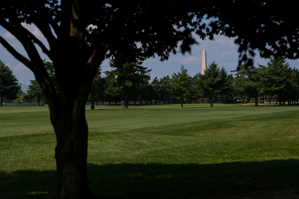 The Washington Monument is seen beyond the East Potomac Park Golf Course, Tuesday, Sept. 1, 2026, in Washington. (AP Photo/Julia Demaree Nikhinson)