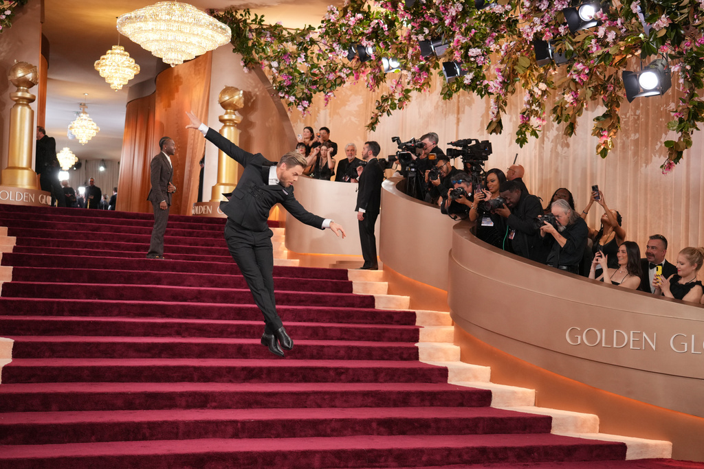 Derek Hough arrives at the 83rd Golden Globes on Sunday, Jan. 11, 2026, at the Beverly Hilton in Beverly Hills, Calif. (Photo by Jordan Strauss/Invision/AP)