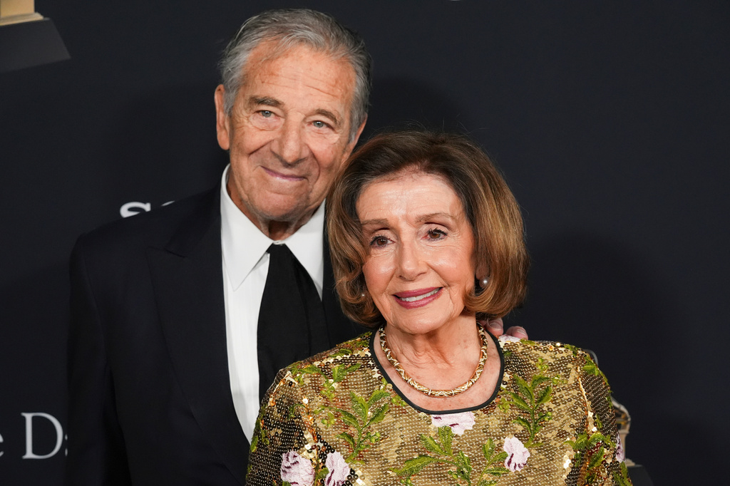FILE - Paul Pelosi, left, and Nancy Pelosi arrive at the Pre-Grammy Gala on Jan. 31, 2026, at the Beverly Hilton Hotel in Beverly Hills, Calif. (AP Photo/Chris Pizzello, File)