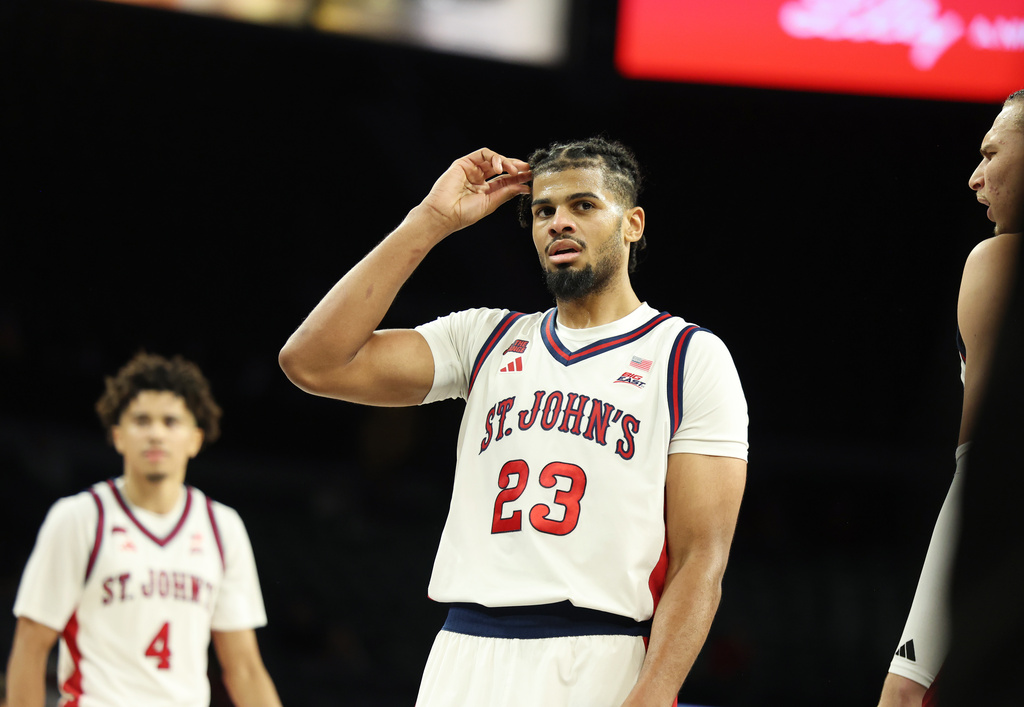 St. John's forward Bryce Hopkins (23) reacts to a call during the first half of an NCAA college basketball game against Baylor Tuesday, Nov. 25, 2025, in Las Vegas. (AP Photo/Ronda Churchill)