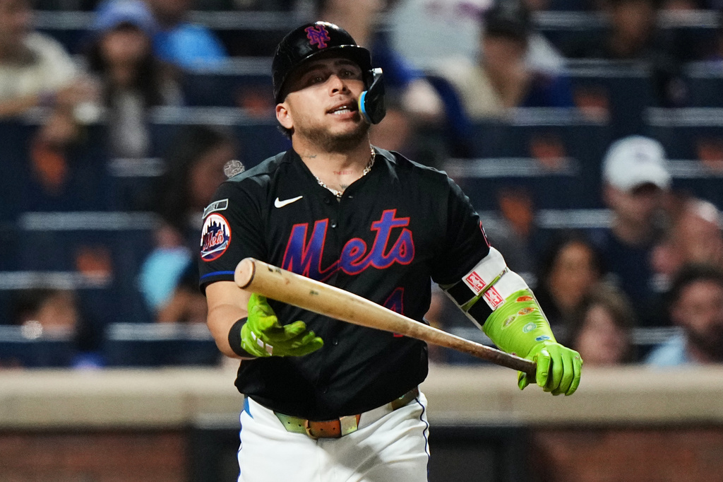 New York Mets' Francisco Alvarez reacts after striking out during the seventh inning of a baseball game against the Miami Marlins Friday, July 31, 2026, in New York. (AP Photo/Frank Franklin II)