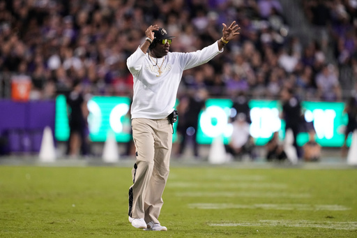Colorado head coach Deion Sanders calls for a time out in the first half of an NCAA college football game against TCU Saturday, Oct. 4, 2025, in Fort Worth, Texas. (AP Photo/Tony Gutierrez) Colorado head coach Deion Sanders calls for a time out in the first half of an NCAA college football game against TCU Saturday, Oct. 4, 2025, in Fort Worth, Texas. (AP Photo/Tony Gutierrez)