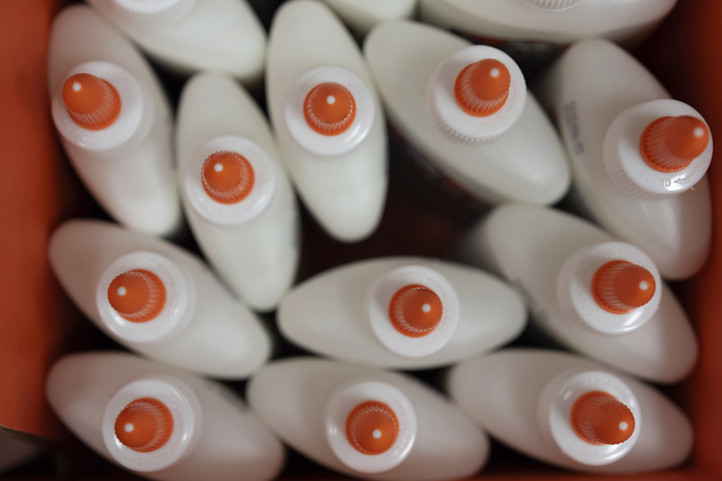 Glue is seen in a back-to-school supplies section of a Target in Sherwood, Ore., Friday, Aug. 8, 2025. (AP Photo/Jenny Kane)