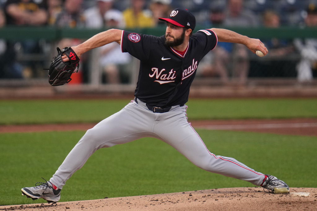 Washington Nationals pitcher PJ Poulin delivers during the first inning of a baseball game against the Pittsburgh Pirates in Pittsburgh, Tuesday, April 14, 2026. (AP Photo/Gene J. Puskar)