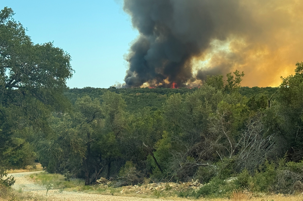 The Ross Fire burns in Palo Pinto County, Texas, on Monday, Aug. 24, 2026. (Texas A&M Forest Service via AP)