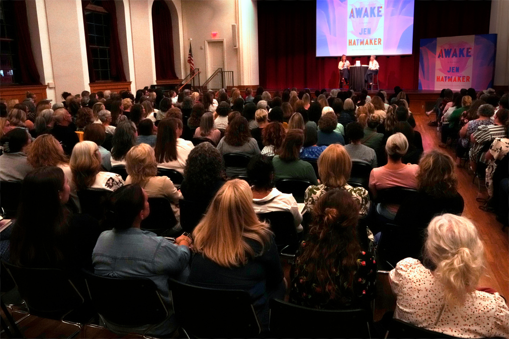 Audience members listen as best-selling Christian writer and influencer Jen Hatmaker talks about her new book, "Awake," in Nashville, Tenn., on Sept. 25, 2025. (AP Photo/Mark Humphrey)