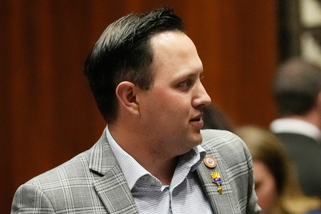 FILE - Former Arizona state Rep. Austin Smith, R-Wittmann, pauses during a session on the floor during a debate on the Arizona abortion law at the capitol, April 24, 2024, in Phoenix. (AP Photo/Ross D. Franklin, File)