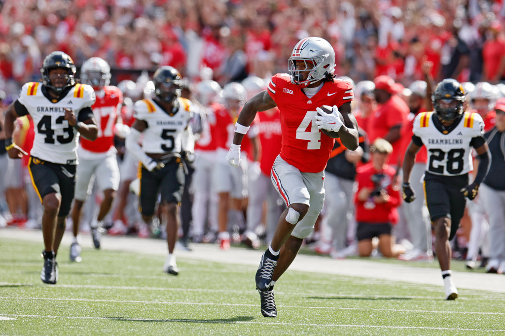 FILE- Ohio State receiver Jeremiah Smith plays against Grambling State during an NCAA college football game, Sept. 6, 2025, in Columbus, Ohio. (AP Photo/Jay LaPrete, File)
