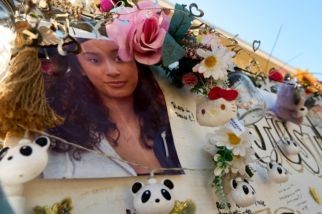 A makeshift Memorial for Celeste Rivas Hernandez, who was killed and found inside a vehicle owned by singer D4vd, is placed outside her home in Lake Elsinore, Calif., on Tuesday, April 21, 2026. (AP Photo/Damian Dovarganes)