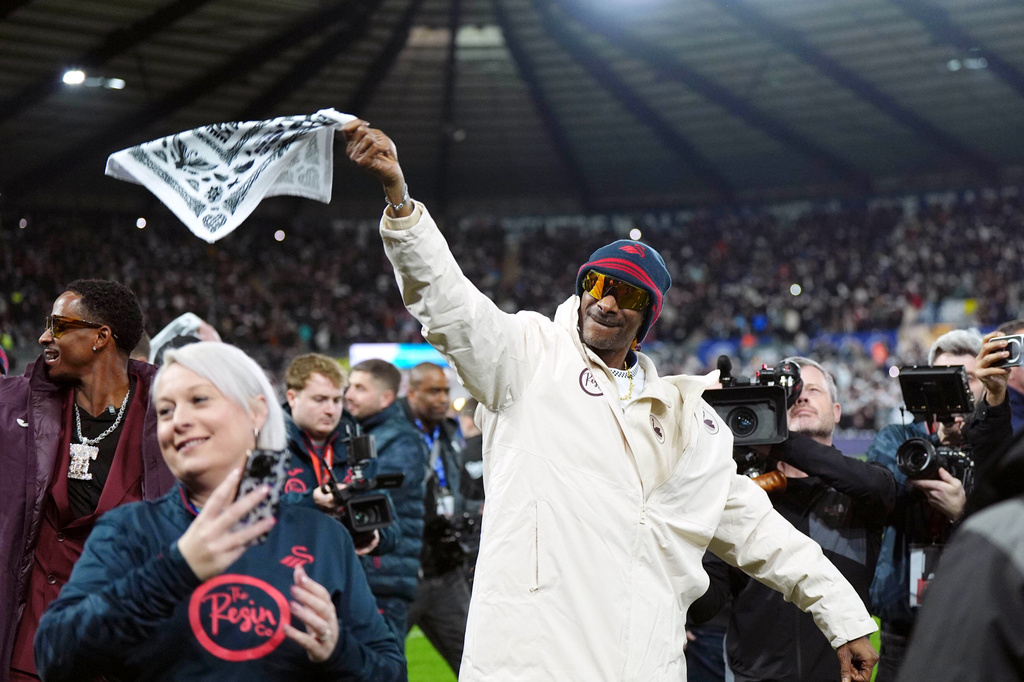 Swansea City co-owner Snoop Dogg ahead of the English Championship soccer match between Swansea City and Preston in Swansea, Wales, Tuesday, Feb. 24, 2026. (Jacob King/PA via AP)