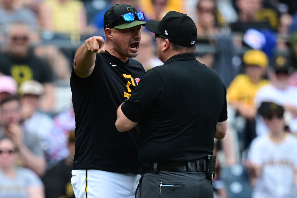 Pittsburgh Pirates manager Don Kelly argues with umpire Dan Bellino after being ejected during the second inning of a baseball game against the Chicago Cubs, Monday, May 25, 2026, in Pittsburgh. (AP Photo/David Dermer)