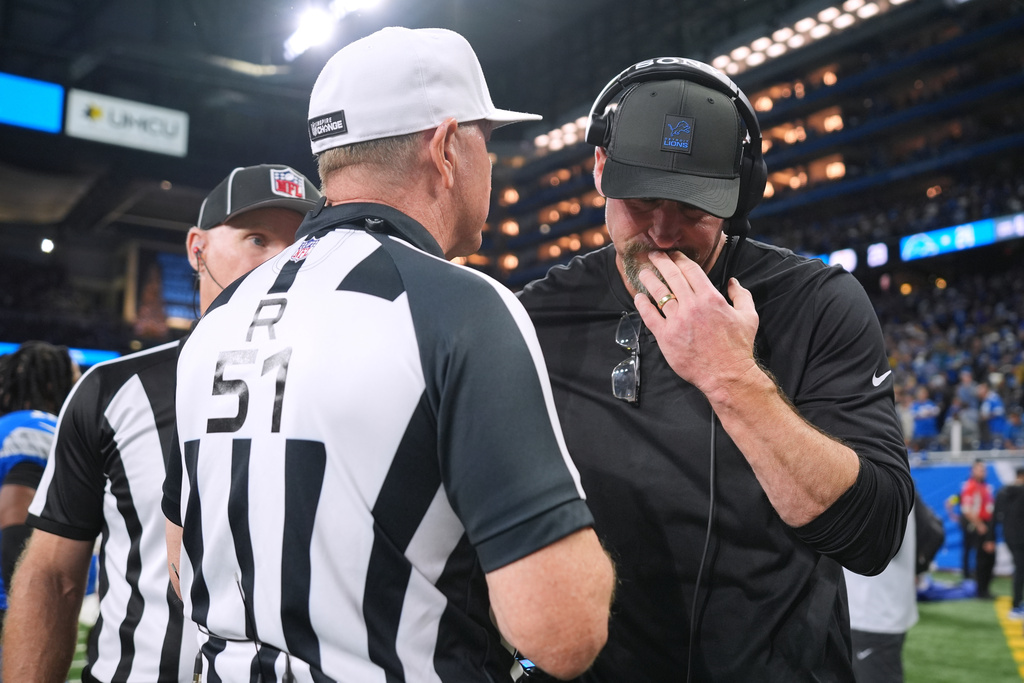 Detroit Lions head coach Dan Campbell talks with officials after the final play of an NFL football game against the Pittsburgh Steelers, Sunday, Dec. 21, 2025, in Detroit. (AP Photo/Ryan Sun)
