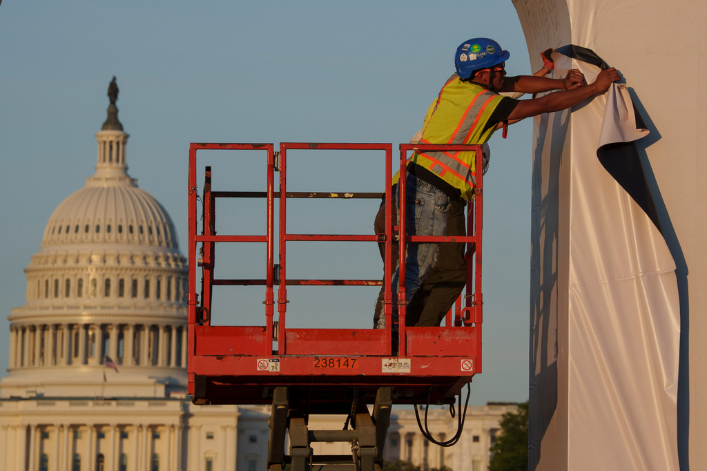 Preparation continues for the Great American State Fair on the National Mall, Sunday, June 21, 2026, in Washington. (AP Photo/Jon Elswick