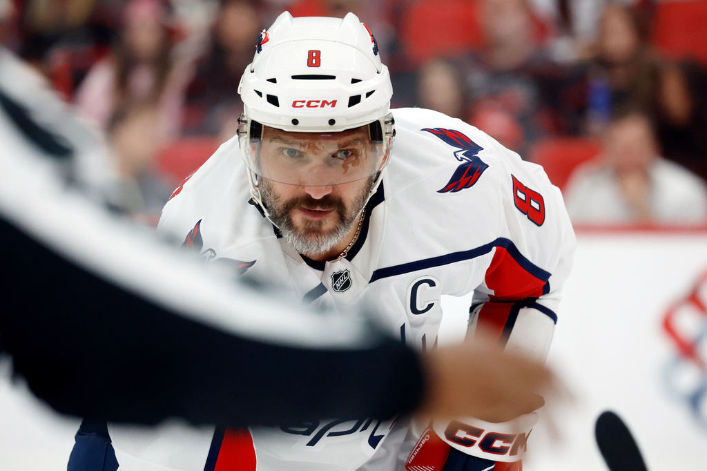 Washington Capitals' Alex Ovechkin watches the puck during the first period of an NHL hockey game against the Carolina Hurricanes in Raleigh, N.C., Friday, Oct. 2, 2026. (AP Photo/Karl DeBlaker)