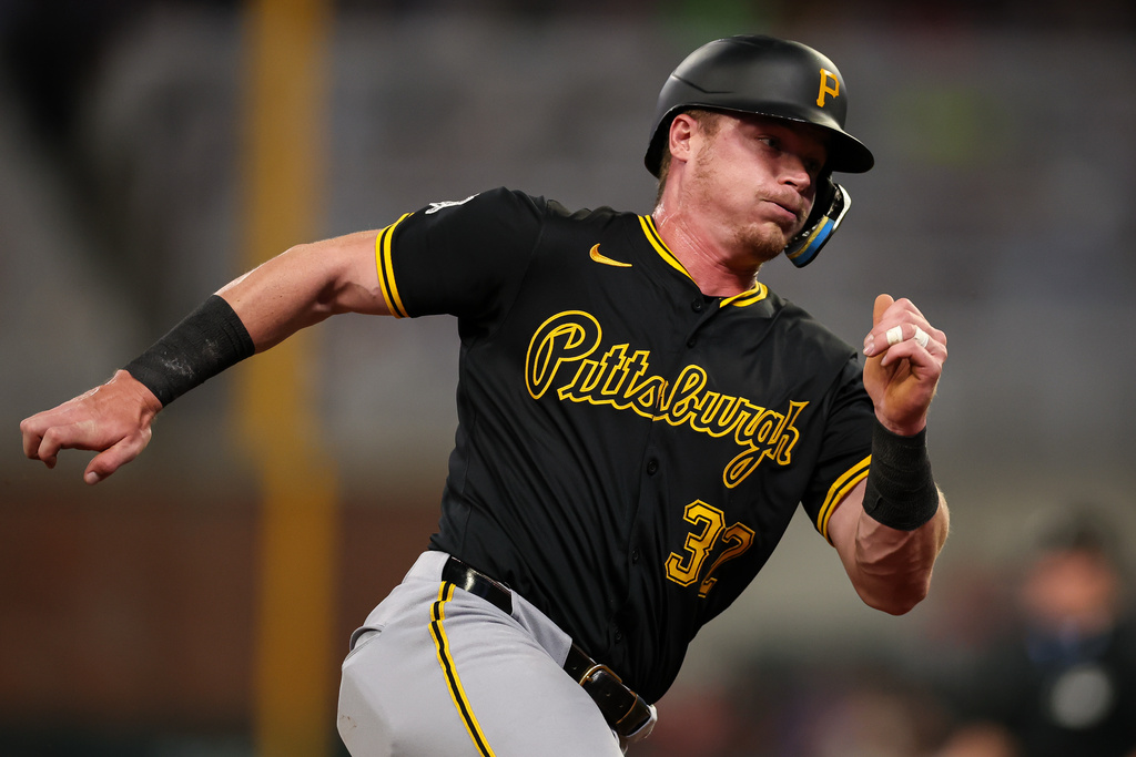 Pittsburgh Pirates' Henry Davis rounds third base before scoring in the second inning of a baseball game against the Atlanta Braves, Friday, Sept. 26, 2025, in Atlanta. (AP Photo/Colin Hubbard)