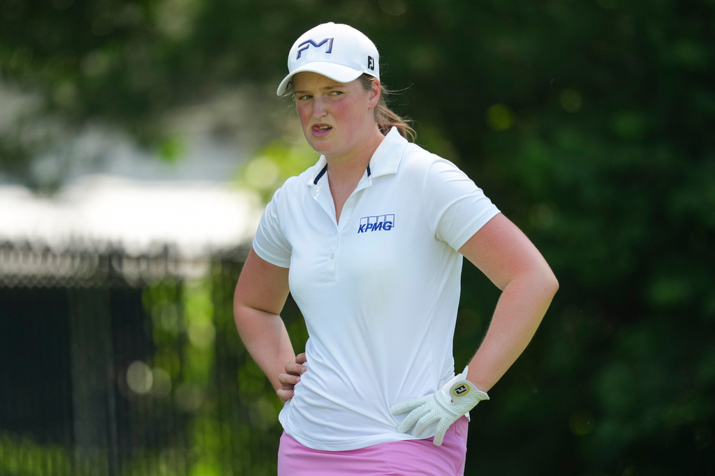 Lottie Woad looks on from the sixth hole during the final round of the Queen City Championship LPGA golf tournament, Sunday, May 17, 2026, in Cincinnati. (AP Photo/Jeff Dean)