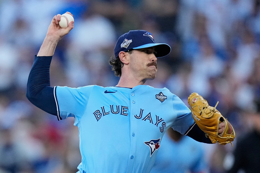 Toronto Blue Jays pitcher Shane Bieber throws against the Los Angeles Dodgers during the first inning in Game 4 of baseball's World Series, Tuesday, Oct. 28, 2025, in Los Angeles. (AP Photo/Brynn Anderson) Toronto Blue Jays pitcher Shane Bieber throws against the Los Angeles Dodgers during the first inning in Game 4 of baseball's World Series, Tuesday, Oct. 28, 2025, in Los Angeles. (AP Photo/Brynn Anderson)