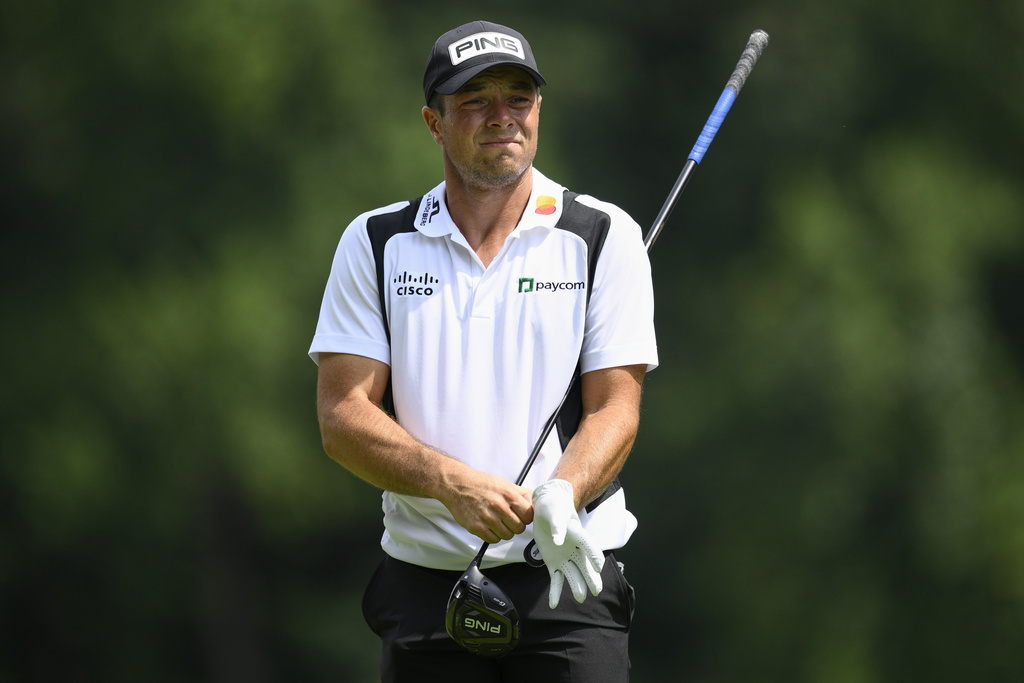 Viktor Hovland, of Norway, prepares to hit from the seventh tee during the first round of the BMW Championship golf tournament Thursday, Aug. 14, 2025, in Owings Mills, Md. (AP Photo/Nick Wass)