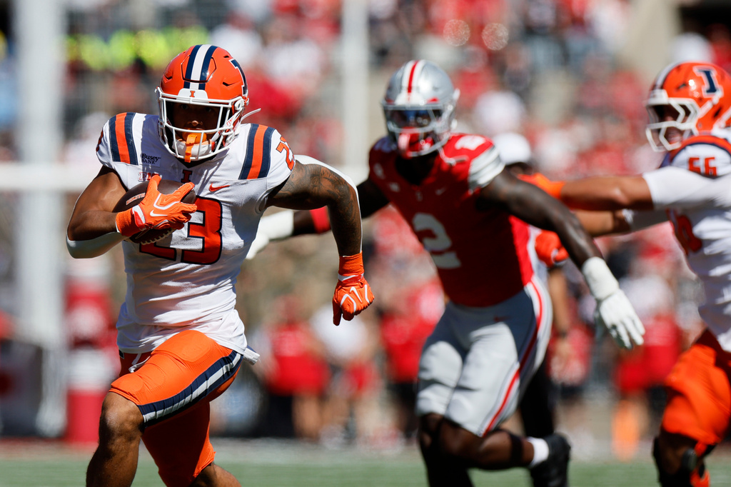 Illinois running back Jordan Anderson outruns the Ohio State defense to score a touchdown during the first half of an NCAA college football game, Saturday, Sept. 26, 2026, in Columbus, Ohio. (AP Photo/Jay LaPrete)