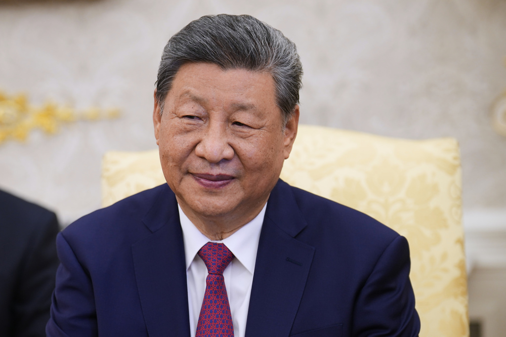 China's President Xi Jinping listens in the Oval Office of the White House as he meets with President Donald Trump, Thursday, Sept. 24, 2026, in Washington. (AP Photo/Jacquelyn Martin)