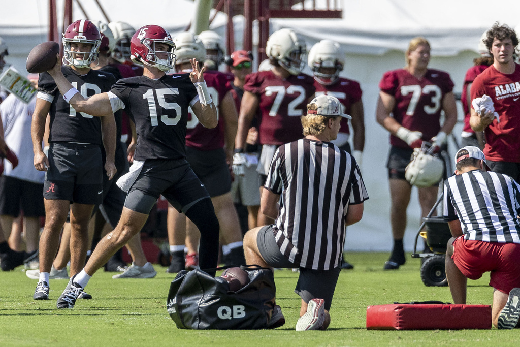 Alabama quarterback Ty Simpson (15) works through drills during an NCAA college football practice, Thursday, July 31, 2025, at the Thomas-Drew Practice Fields in Tuscaloosa, Ala. (AP Photo/Vasha Hunt)