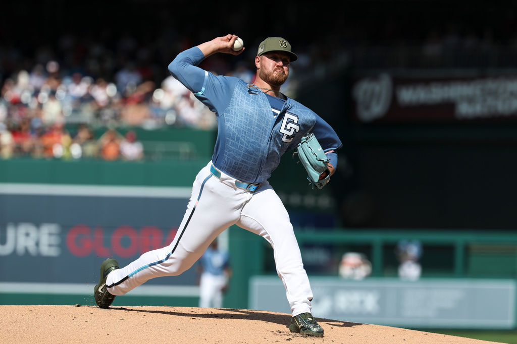 Washington Nationals pitcher Cade Cavalli throws during the first inning of a baseball game against the Baltimore Orioles, Saturday, May 16, 2026, in Washington. (AP Photo/Terrance Williams)