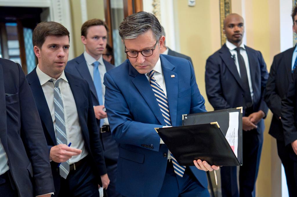 Speaker of the House Mike Johnson, R-La., leaves the chamber as members debate a series of measures including a continuing resolution to fund the government and a spending package for the Iran war, at the Capitol in Washington, Tuesday, July 21, 2026. (AP Photo/J. Scott Applewhite)