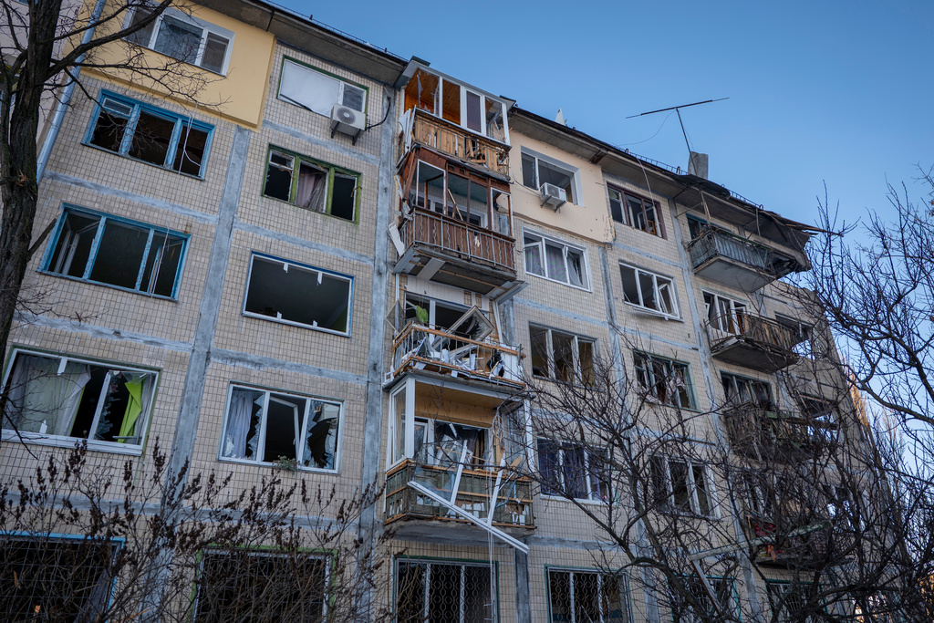 A damaged apartment house is seen following Russia's missile and drone attack in Kyiv, Ukraine, Tuesday, Feb. 3, 2026. (AP Photo/Dan Bashakov)