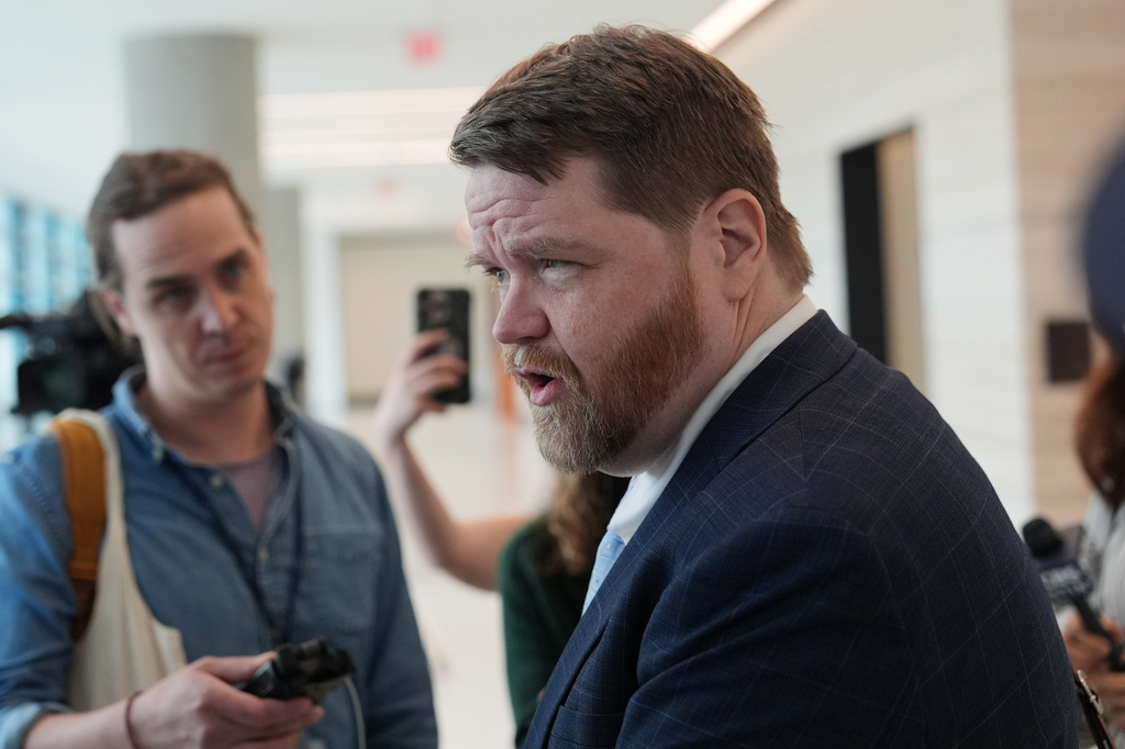 Mark Bankston, an attorney for relatives of the victims of the 2012 Sandy Hook School shooting, speaks to the media following a hearing at the county courthouse in Austin, Texas, Thursday, April 30, 2026. (AP Photo/Eric Gay)
