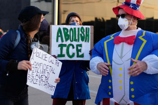 Protesters gather outside an ICE processing facility in the Chicago suburb of Broadview, Ill., Friday, Oct. 31, 2025. (AP Photo/Nam Y. Huh) Protesters gather outside an ICE processing facility in the Chicago suburb of Broadview, Ill., Friday, Oct. 31, 2025. (AP Photo/Nam Y. Huh)