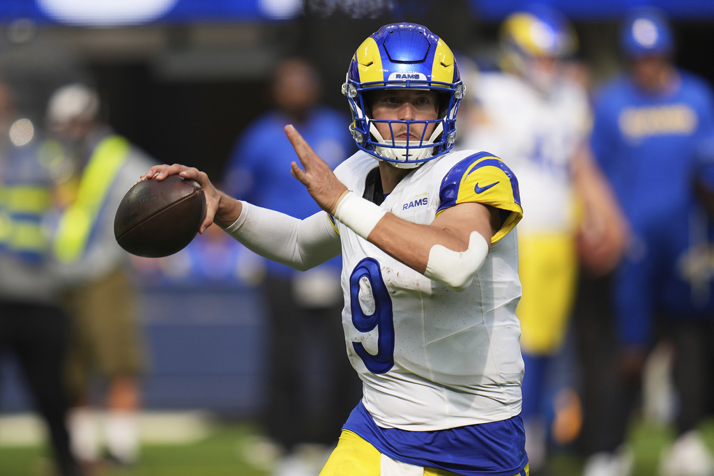 Los Angeles Rams quarterback Matthew Stafford (9) passes against the Houston Texans during the second half of an NFL football game, Sunday, Sept. 7, 2025, in Inglewood, Calif. (AP Photo/Gregory Bull)