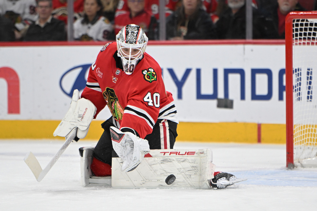 Chicago Blackhawks goalie Arvid Soderblom makes a save during the first period of an NHL hockey game against the Vegas Golden Knights, Sunday, Jan. 4, 2026, in Chicago. (AP Photo/Paul Beaty)