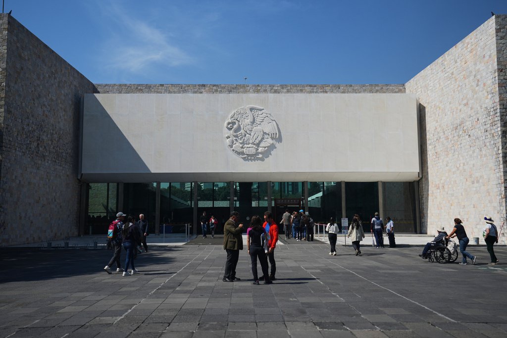 The entrance of Mexico City's National Museum of Anthropology features Mexico's national emblem on its façade, Friday, Nov. 14, 2025. (AP Photo/Claudia Rosel)