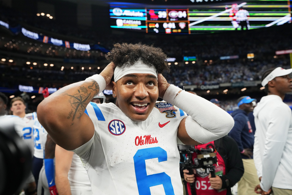 Mississippi quarterback Trinidad Chambliss (6) celebrates after the Sugar Bowl NCAA college football playoff quarterfinal game against Georgia in New Orleans, Thursday, Jan. 1, 2026. (AP Photo/Mathew Hinton)