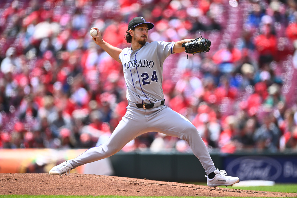 Colorado Rockies pitcher Michael Lorenzen throws during the second inning of a baseball game against the Cincinnati Reds in Cincinnati, Thursday, April 30, 2026. (AP Photo/Ben Jackson)