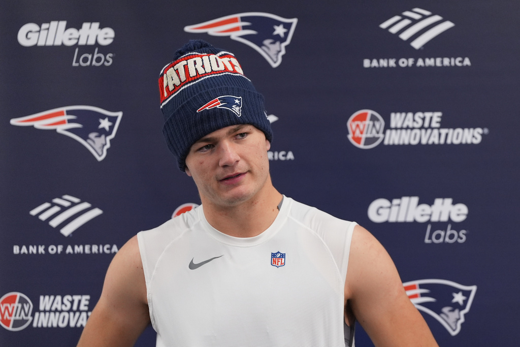 New England Patriots quarterback Drake Maye speaks at a news conference after an NFL football game against the Baltimore Ravens, Sunday, Dec. 21, 2025, in Baltimore. (AP Photo/Stephanie Scarbrough)