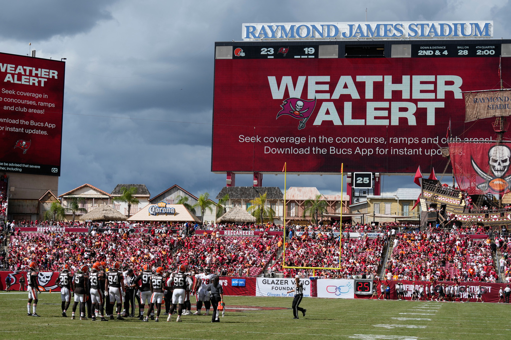 A weather alert is announced during the second half of an NFL football game between the Tampa Bay Buccaneers and the Cleveland Browns in Tampa, Fla., Sunday, Sept. 20, 2026. (AP Photo/Chris O'Meara)